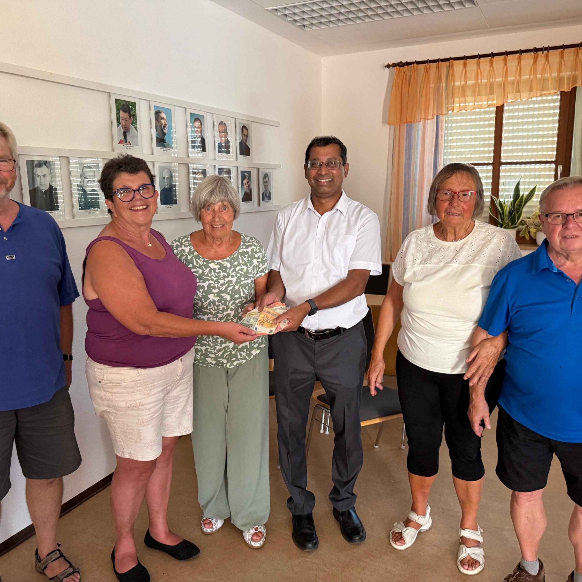 Geldübergabe Kräuterbüschel